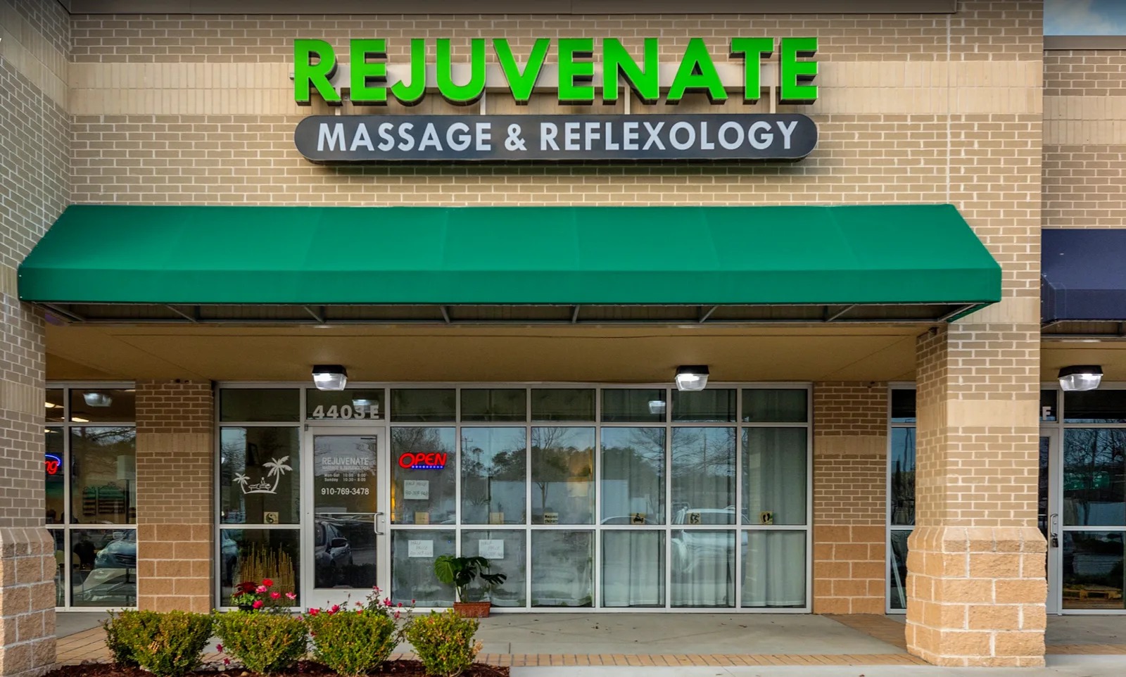 Rejuvenate Spa & Reflexology storefront with green awning